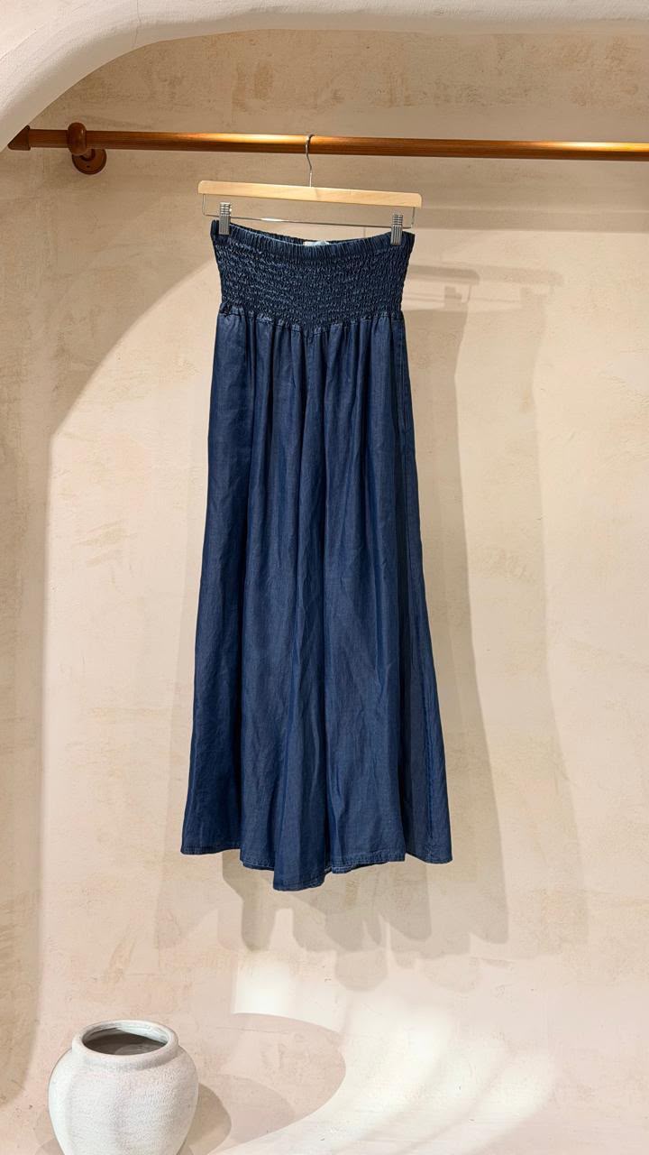 Amalfi Palazzo Pants — navy pair displayed on a hanger