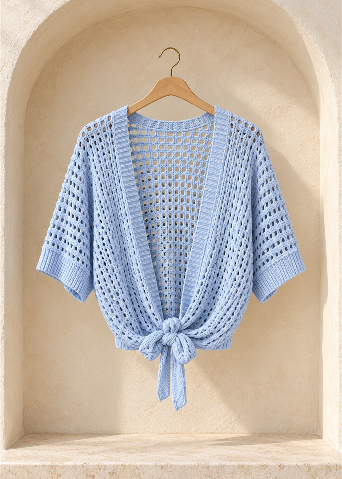 Capri Tie-Front Open-Knit Cardigan in Light Blue, with loose sleeves and ribbed edges