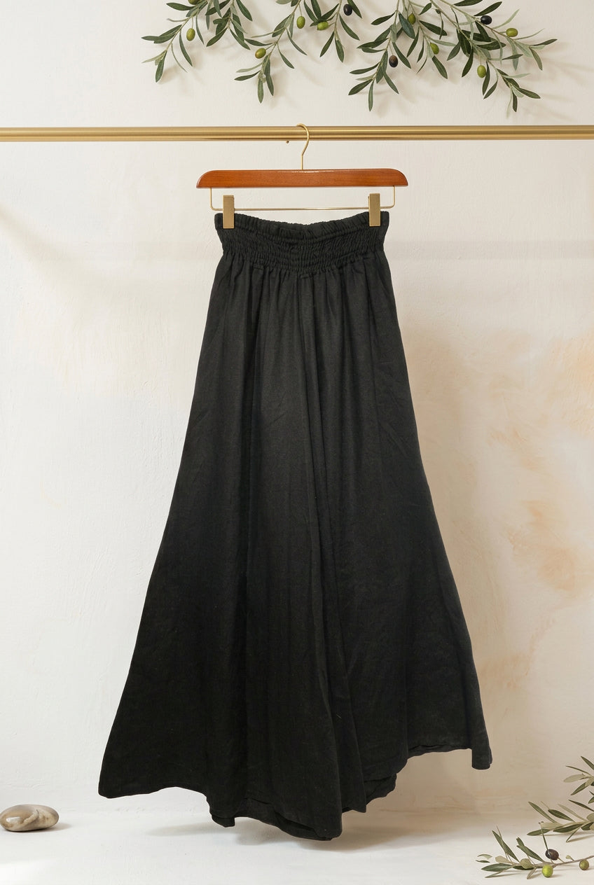 Italian 100% Linen Flared Pants — black flared pants displayed on hanger