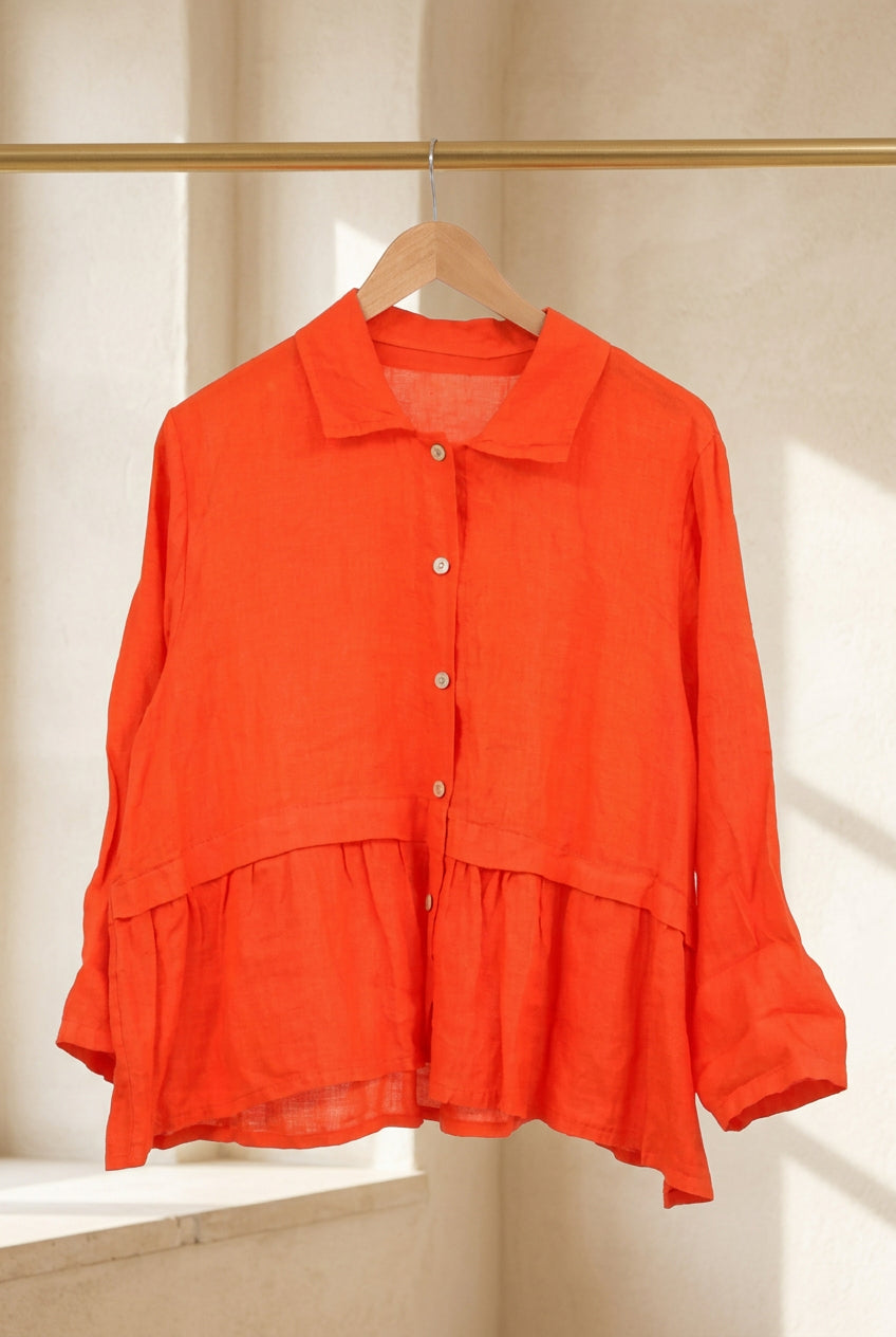 Italian 100% Linen Peplum Button-Down Shirt — orange button-down peplum shirt on hanger