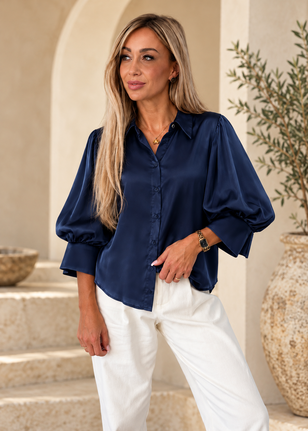 Italian navy satin-effect shirt on a model, three-quarter puff sleeves, wide cuffs and tonal buttons