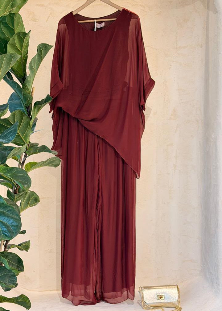 Italian Silk Two-Piece Set — burgundy asymmetric top and pleated pants on hanger
